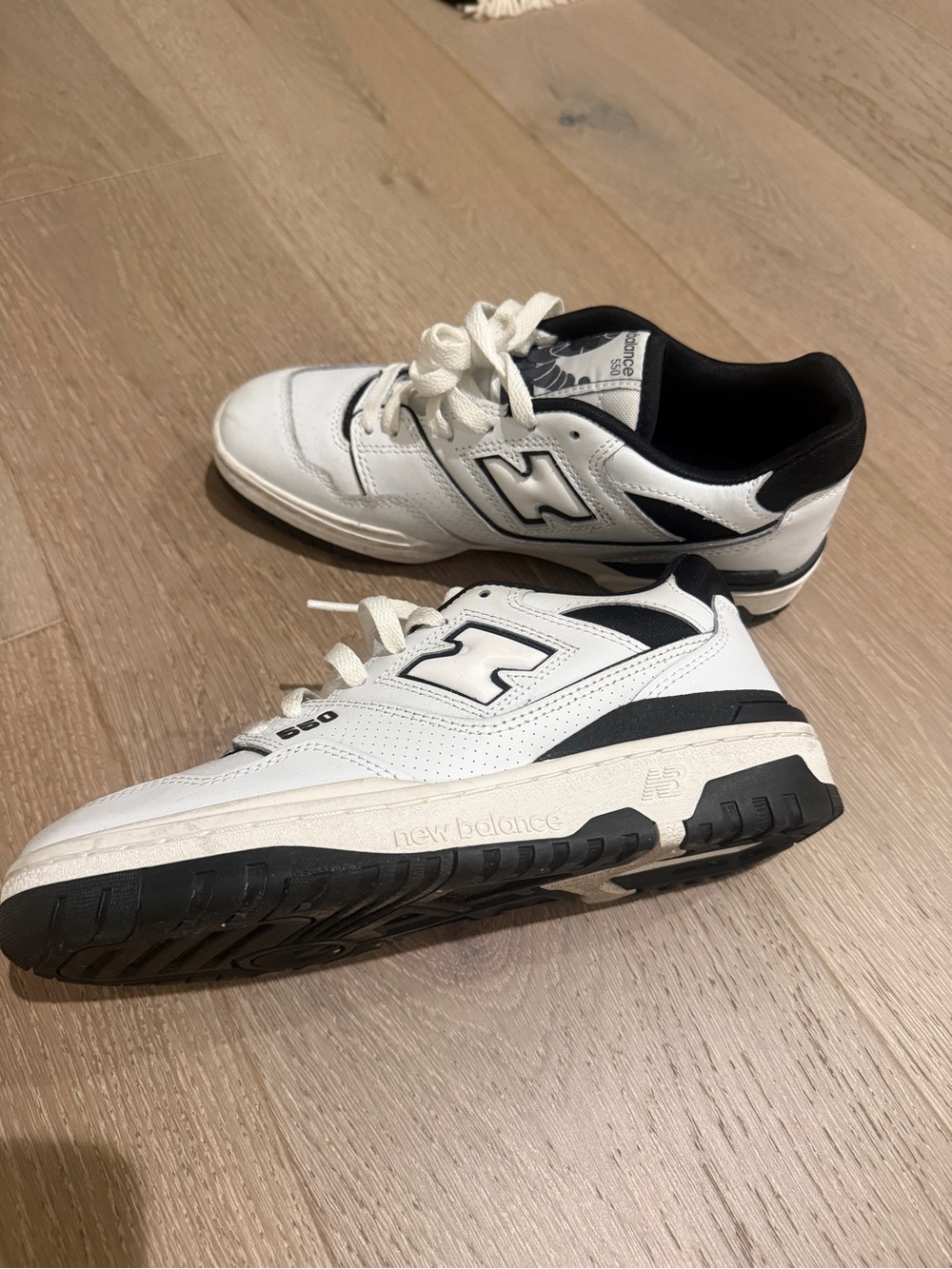 New Balance White and Black Leather Sneakers